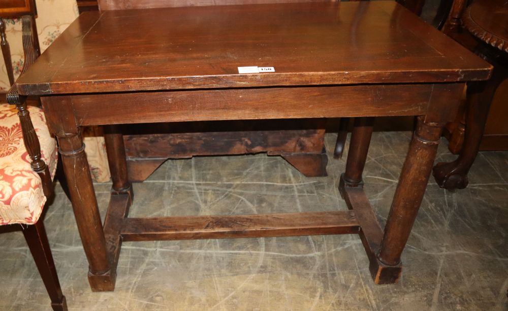 A walnut table, on gun barrel turned legs with H stretchers and block feet, 18th century and later, W.98cm, D.58cm, H.73cm